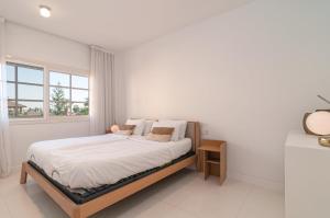 Posteľ alebo postele v izbe v ubytovaní Luxurious Apartment In Terrazas Del Duque