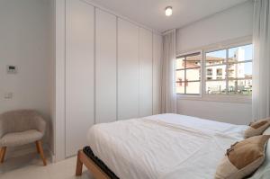 Posteľ alebo postele v izbe v ubytovaní Luxurious Apartment In Terrazas Del Duque