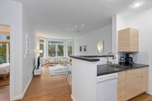 a kitchen with a sink and a counter top at Belltown's Flower Moon, near The Space Needle in Seattle