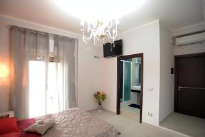 Postel nebo postele na pokoji v ubytování Guest House Elettra