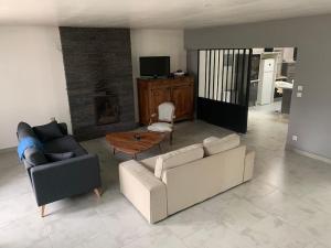 Khu vực ghế ngồi tại Maison de campagne en Vendée