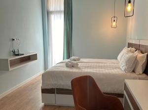 Postel nebo postele na pokoji v ubytování Villa N40