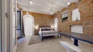 A bed or beds in a room at La Casetta in colonne Még 3 kép