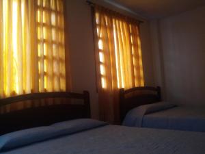 Postel nebo postele na pokoji v ubytování Hotel Krone
