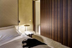 Letto o letti in una camera di ME Milan Il Duca