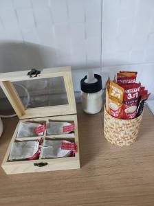 a wooden box with a basket of food next to it at Apartman - GOLEMI MOST in Pirot