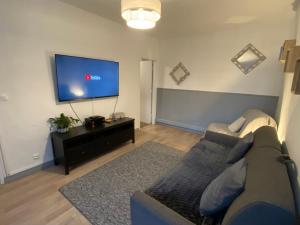 Khu vực ghế ngồi tại Maison centre village Soligny la Trappe proche Mortagne au perche - Sanateflo -