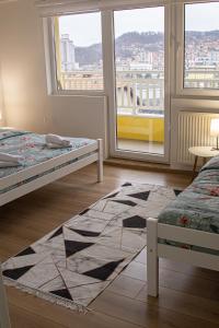 Ένα ή περισσότερα κρεβάτια σε δωμάτιο στο Apartment Forever