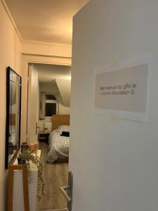 Postel nebo postele na pokoji v ubytování Le Cocon Douaisien