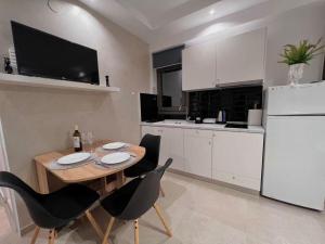 Kuchyň nebo kuchyňský kout v ubytování Delight House's + 8 fotografií
