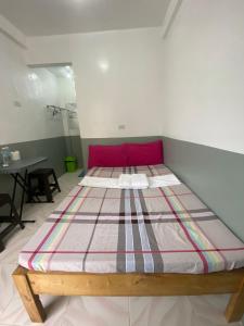 Postel nebo postele na pokoji v ubytování Jugalbot Tourist Inn