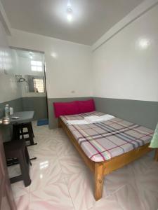 Postel nebo postele na pokoji v ubytování Jugalbot Tourist Inn