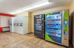 a store with a soda machine in a room at Extended Stay America Select Suites - Chicago - Downers Grove in Downers Grove