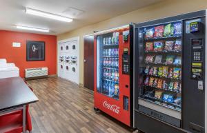 a cocacola soda vending machine in a store at Extended Stay America Suites - Great Falls - Missouri River in Great Falls