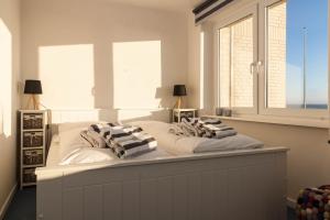 Ein Bett oder Betten in einem Zimmer der Unterkunft Odde Blick