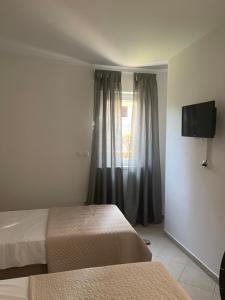 Postel nebo postele na pokoji v ubytování Villa Dijana