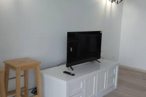 A television and/or entertainment centre at Silverpar B5-5-1 Mountain View(walk up 2 floor up)