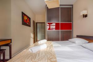Posteľ alebo postele v izbe v ubytovaní Beach Point Apartment - Neptun Park