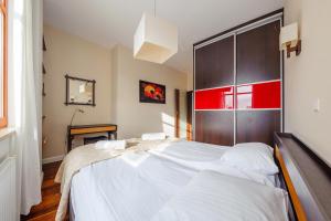 Posteľ alebo postele v izbe v ubytovaní Beach Point Apartment - Neptun Park