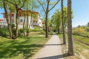 Vonkajšia záhrada v ubytovaní Beach Point Apartment - Neptun Park