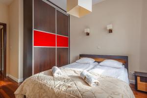 Posteľ alebo postele v izbe v ubytovaní Beach Point Apartment - Neptun Park