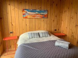 Postel nebo postele na pokoji v ubytování Nomad Tiny