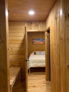 Postel nebo postele na pokoji v ubytování Nomad Tiny