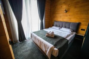 Tempat tidur dalam kamar di Discovery-Borovoe