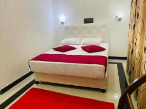 Ένα ή περισσότερα κρεβάτια σε δωμάτιο στο Laaya Neem Dambulla