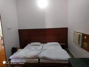BOBY HOME STAY "BOBY MANSION" Jaipur客房内的一张或多张床位
