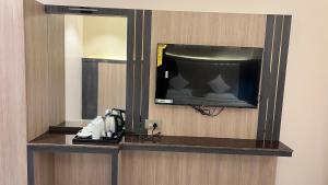 TV a/nebo společenská místnost v ubytování GB RESIDENCY
