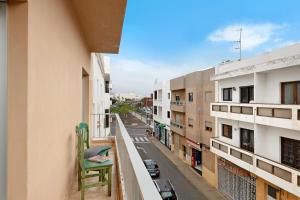 a view of a city street from a balcony at Piso Leon y Castillo B in Arrecife
