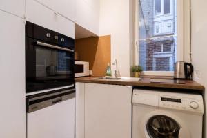 Køkken eller tekøkken på Lille Hypercentre -Appartement 2ch, 5p + 18 billeder