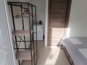 Ένα ή περισσότερα κρεβάτια σε δωμάτιο στο Porto Almira Studio