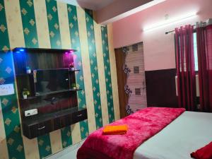 TV i/ili multimedijalni sistem u objektu Hotel Shri Hari Residency