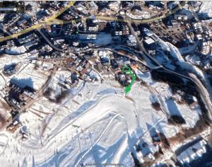 an overhead view of a city in the snow at Appartamento Lusso Panoramic - Andalo in Andalo