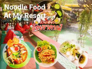 a table with two plates of food on it at Kanda Hill Resort in Ban Na Sok +6 photos