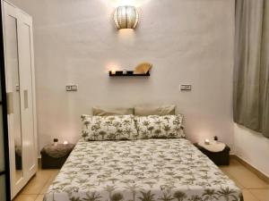 Postel nebo postele na pokoji v ubytování APARTBEACH ADRIATICO 111 CLIMATIZADO y VISTAS PLAYA + 38 fotografií