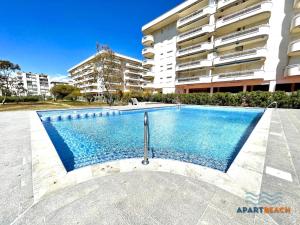 Bazén v ubytování APARTBEACH ADRIATICO 111 CLIMATIZADO y VISTAS PLAYA nebo v jeho okolí