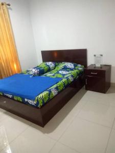 Postel nebo postele na pokoji v ubytování Cozy house in Pekayon, Bekasi