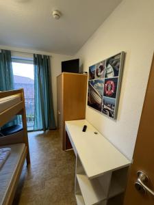 Postel nebo postele na pokoji v ubytování Ferienwohnung Roter Sand