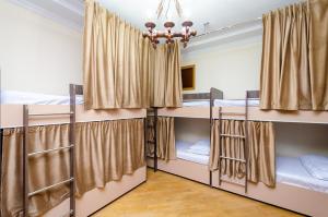 a group of four bunk beds in a room at Areva Hostel & Apartment in Yerevan