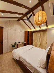 Savera Seafront客房内的一张或多张床位