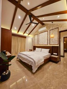 Savera Seafront客房内的一张或多张床位