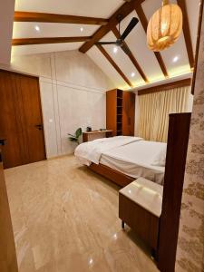 Savera Seafront客房内的一张或多张床位