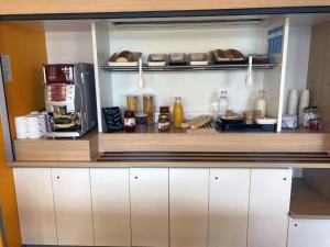 Kuchyň nebo kuchyňský kout v ubytování KRYSTAL HOTEL