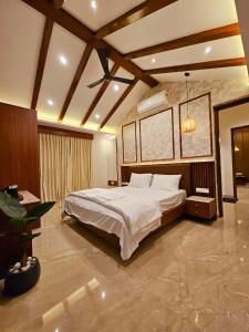 Savera Seafront客房内的一张或多张床位