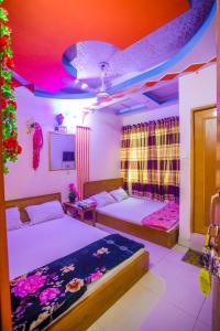 - une chambre avec 2 lits dans l'établissement Hotel Victoria Inn (Nazimuddin Road), à Dhaka