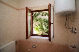 Kúpeľňa v ubytovaní Apartment in Rabac 16698 + 33 fotografií