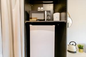 Kuchyň nebo kuchyňský kout v ubytování Komfortables Doppelzimmer in Kehl Goldscheuer - 1A Guesthouse + 11 fotografií
